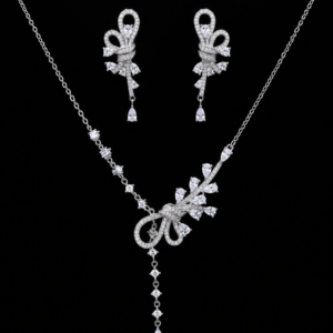Delicate Crystal Bow & Leaf Drop Pendant Set